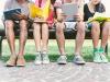 Students reading outdoors